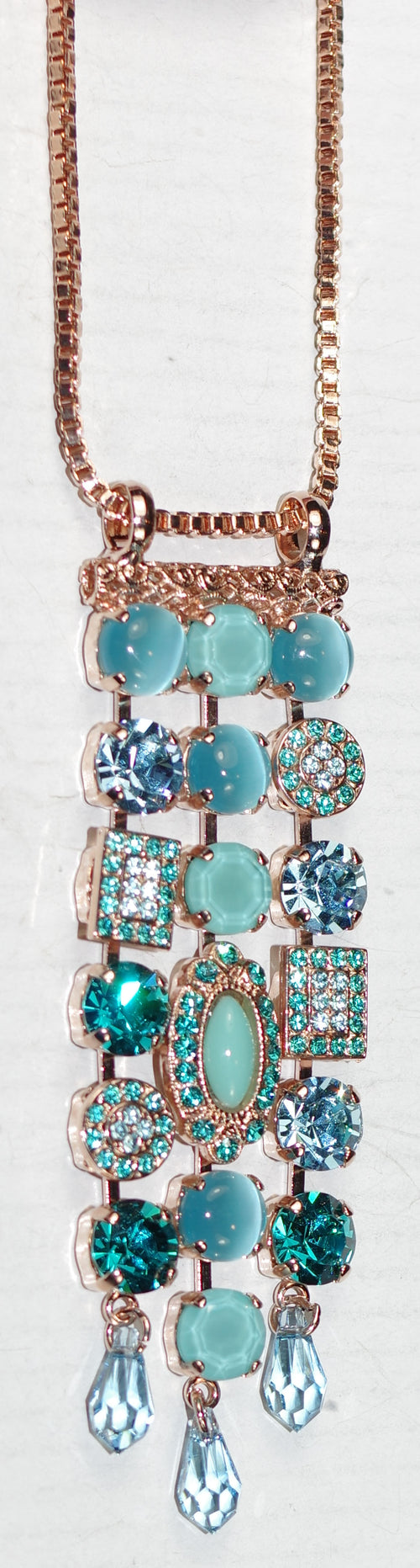 MARIANA PENDANT ADDICTED TO LOVE: blue, teal stones in 3.5" rose gold setting, 28" adjustable chain