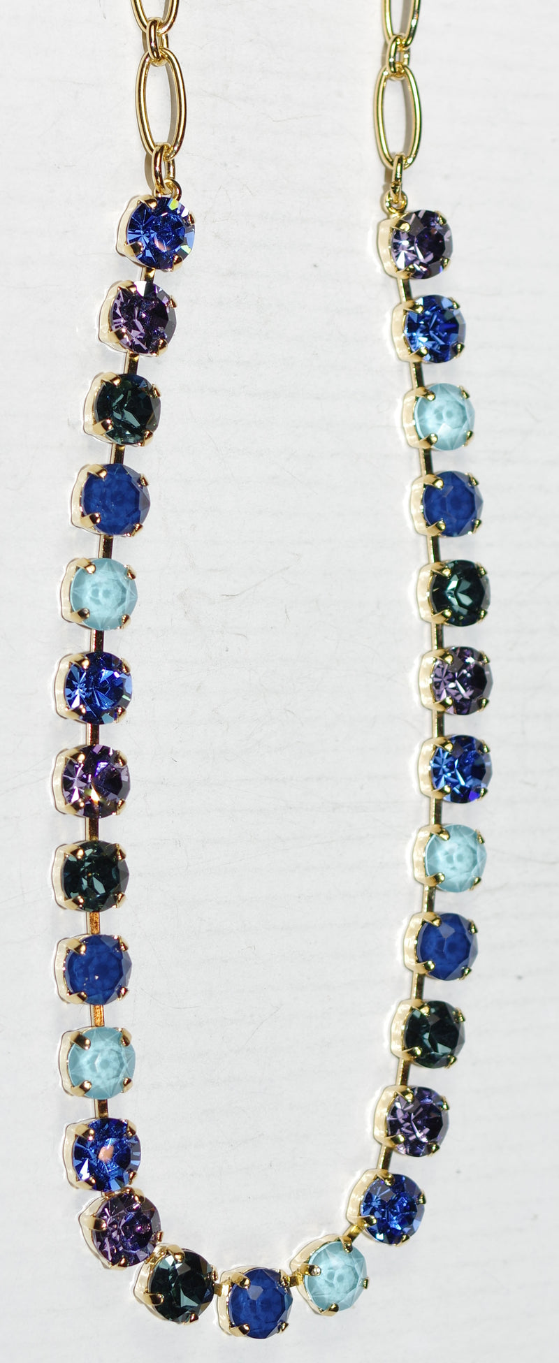 MARIANA NECKLACE ELECTRIC BLUE BETTE: blue, purple, teal stones in yellow gold setting, 17" adjustable chain