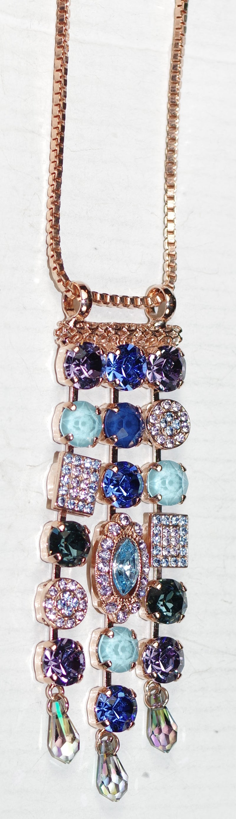 MARIANA PENDANT ELECTRIC BLUE: blue, teal, lavender stones in 3.5" rose gold setting, 28" adjustable chain