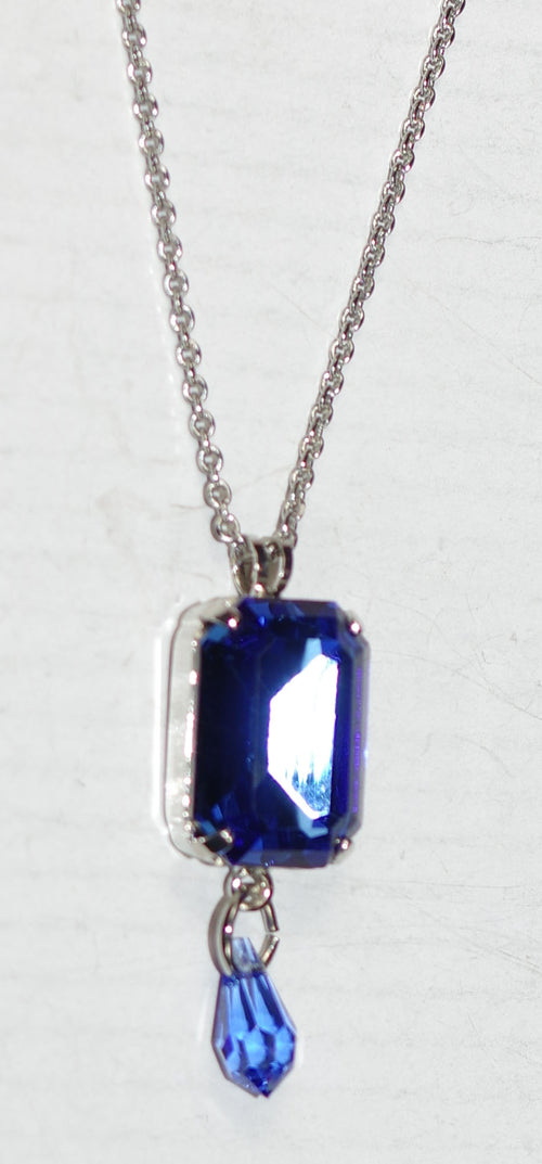 MARIANA PENDANT ELECTRIC BLUE: blue stones in 1.5" pendant, silver rhodium setting, 19" adjustable chain