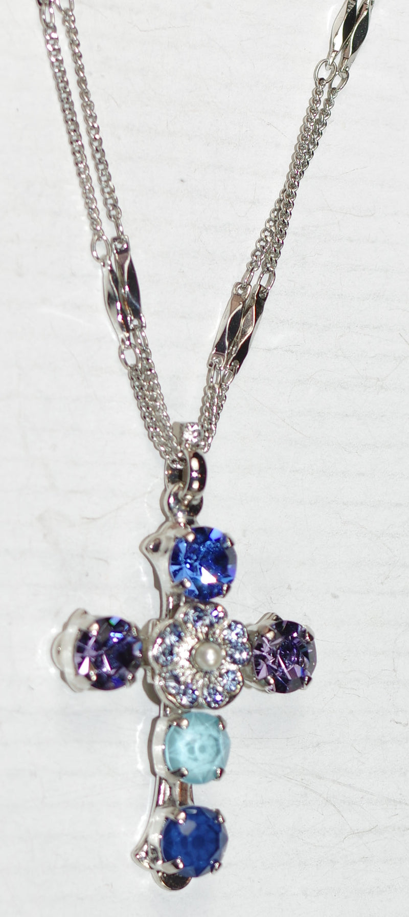 MARIANA CROSS PENDANT ELECTRIC BLUE: blue, teal, purple, pearl stones in silver rhodium setting, 20" adjustable double chain