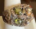 STERLING SILVER CZ LARGE GREEN/AMBER RING