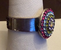 MARIANA RING: pink,. green, blue stones in 1/2" silver setting, adjustable size band