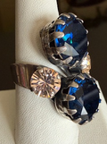 MARIANA RING OCEAN: amber, blue stones in 1.25" silver setting, adjustable size band
