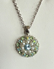 MARIANA ANGEL PENDANT: blue center, pearl, green and a/b stones in rhodium silver setting