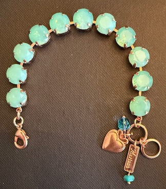 MARIANA BRACELET AQUA CRYSTAL: 1/2" blue stones in rose gold setting