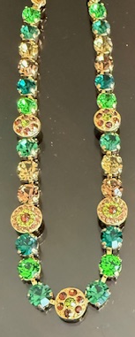 MARIANA NECKLACE EVERGREEN: green, brown, amber 1/4" stones in yellow gold setting, 18" adjustable chain