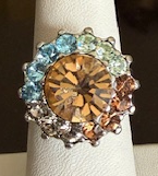 MARIANA RING FORGET ME NOT: blue, amber, green stones in 3/4" silver rhodium setting, adjustable size band