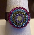 MARIANA RING: pink,. green, blue stones in 1/2" silver setting, adjustable size band