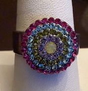 MARIANA RING: pink,. green, blue stones in 1/2" silver setting, adjustable size band