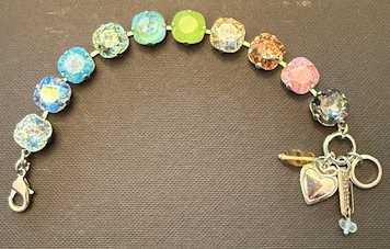 MARIANA  BRACELET FORGET ME NOT: amber, brown, blue, pacific opal 1/2" faceted stones in silver rhodium setting