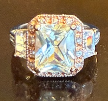 STERLING SILVER CZ RING WITH ROSEGOLD TRIM