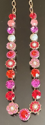 MARIANA NECKLACE ROXANNE: red, pearl, orange, fuchsia 1/2" stones in silver rhodium setting, 18" adjustable chain