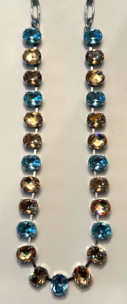 MARIANA NECKLACE FIRST TOAST: blue, amber, light brown stones in silver rhodium setting, 19" adjustable chain