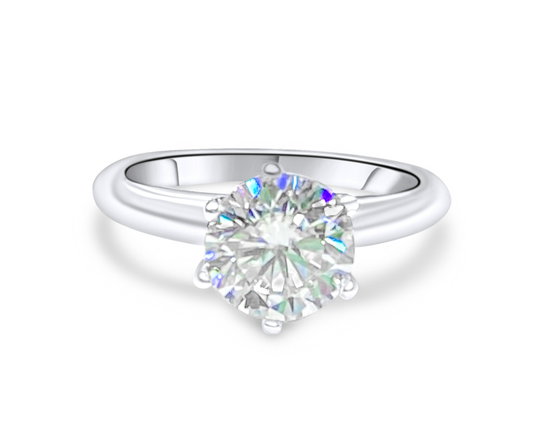 MOISSANITE RING 10001 2 CT MOISSANITE STONE RING, SET IN 9.25 STERLING SILVER. COMES WITH SERIAL NUMBER REGISTRATION CARD