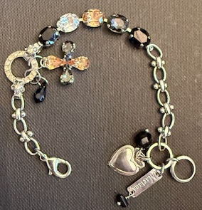 MARIANA BRACELET BLACK ORCHID: black, clear, amber stones in silver rhodium setting