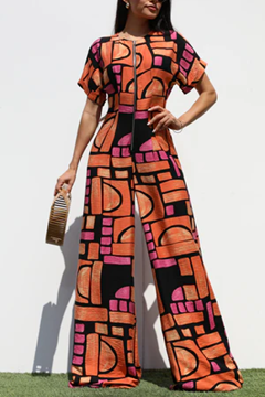 ORANGE PRINTED LOOSE FIT FRONT ZIP JUMPSUIT