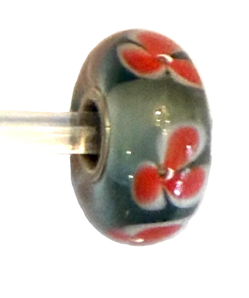 TROLLBEAD UNIVERSAL UNIQUE OLIVE GREEN WITH ORANGE FLOWER