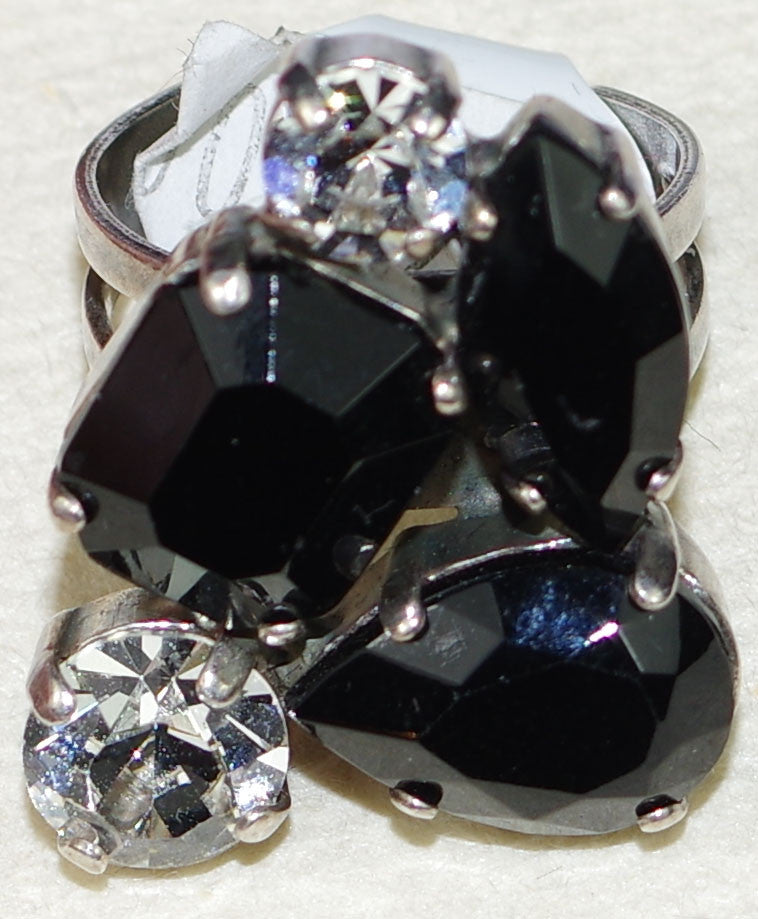 MARIANA RING CHECKMATE: clear, black stones in 1" silver setting, adjustable size band