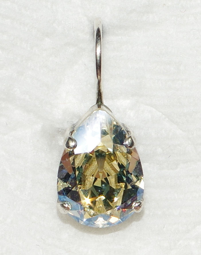 MARIANA EARRINGS ON A CLEAR DAY: clear pear shape stone in 1/2" silver rhodium setting, lever backs