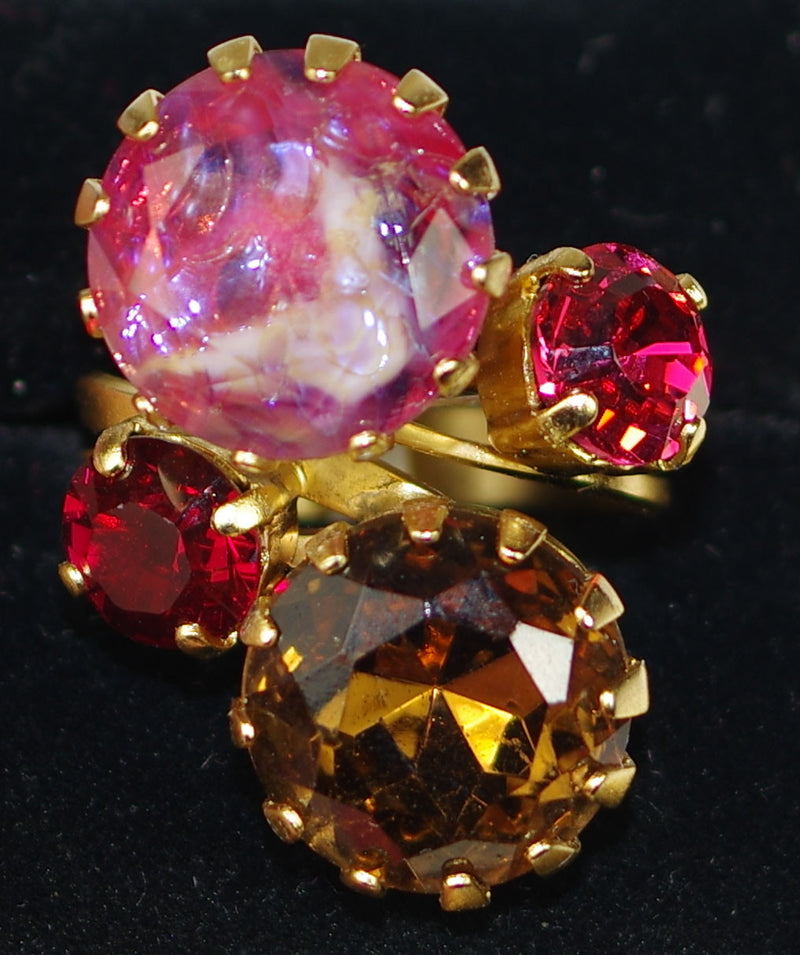 MARIANA RING: red, pink, brown stones in 1.25" yellow gold setting, adjustable size band