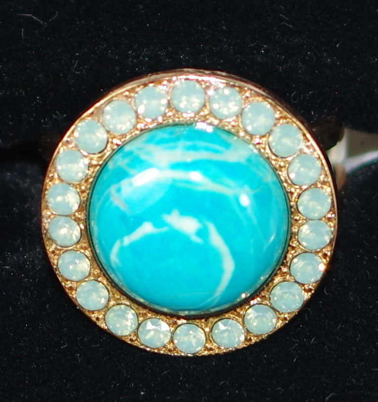 MARIANA RING: blue, pacific opal stones in 3/4" rose gold setting, adjustable size band