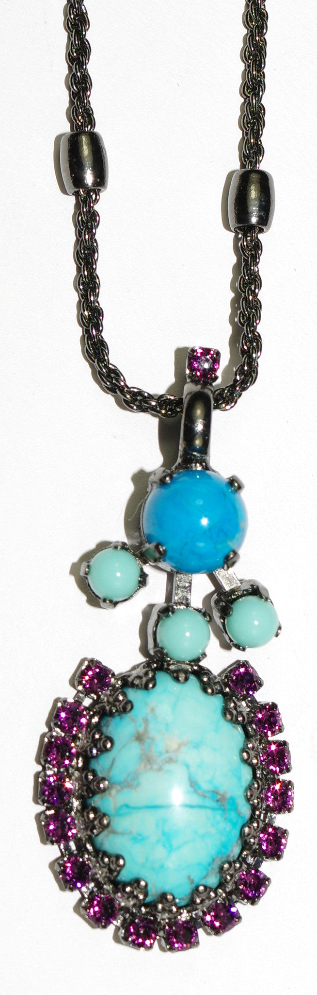 MARIANA PENDANT HAPPINESS: turq, purple, blue stones in 1.5" black gold setting, 20" adjustable chain