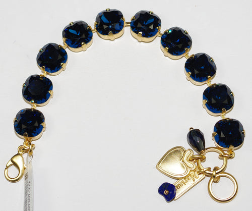 MARIANA BRACELET MONTANA: 1/2" blue stones in yellow gold setting