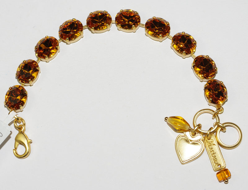 MARIANA BRACELET TOPAZ: 1/2" oval amber stones in yellow gold setting