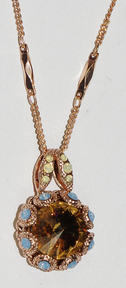 MARIANA PENDANT RHAPSODE: amber, blue, yellow stones in 1" rose gold setting, 18" adjustable chain