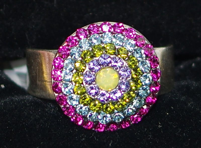 MARIANA RING CUBA STARBURST: pink, blue, purple, yellow stones in 5/8" silver setting, adjustable size band
