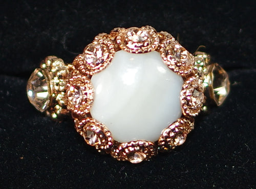 MARIANA RING CHAMPAGNE AND CAVIAR XOXO: white, amber stones in 5/8" rose gold setting, adjustable size band