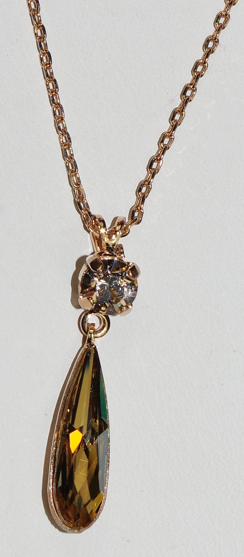 MARIANA PENDANT BARBADOS: amber stones in 1.25" rose gold setting, 18" adjustable chain