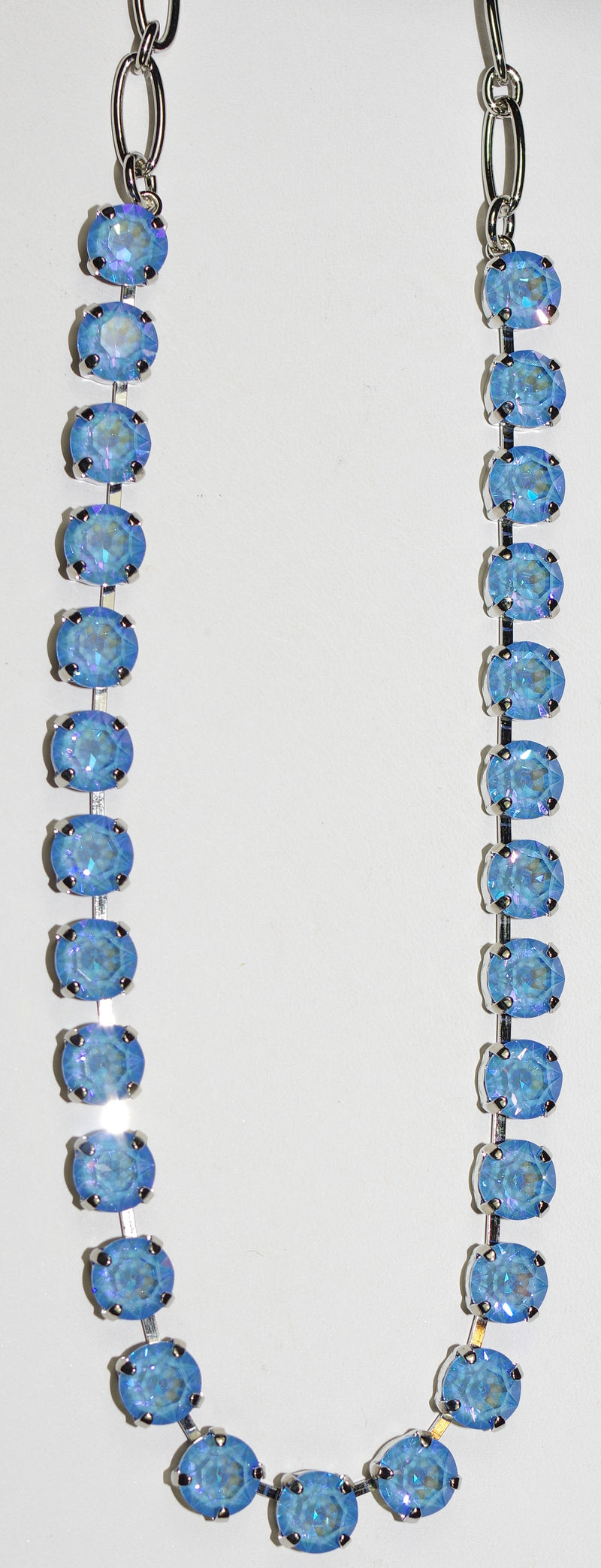 MARIANA NECKLACE BETTE SUN KISSED BLUE: ultra blue 1/4" stones in rhodium setting, 17" adjustable chain