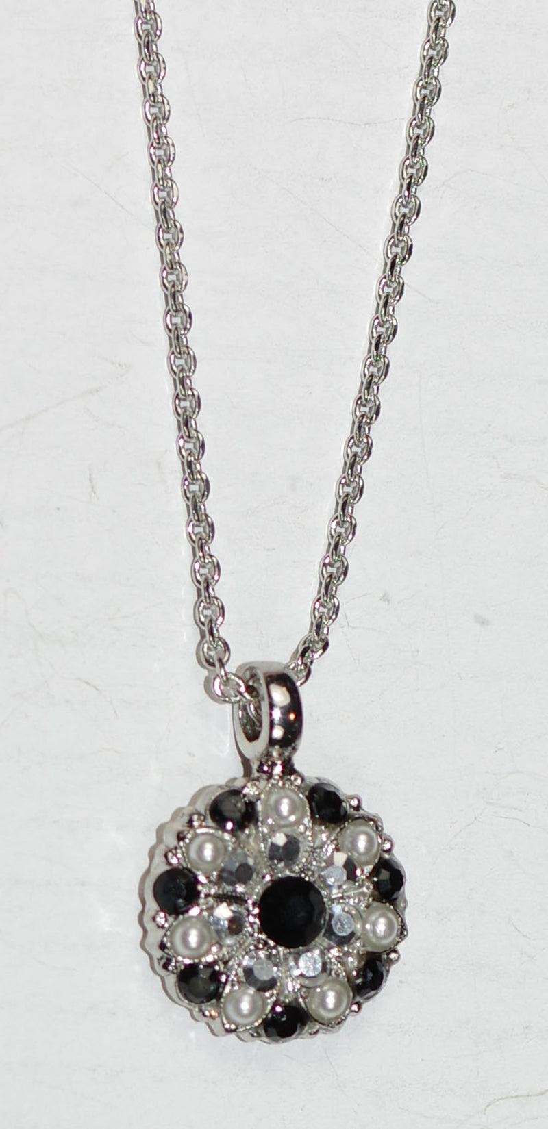 MARIANA ANGEL PENDANT ROCKY ROAD:  black, pearl, a/b stones in silver rhodium setting, 18" adjustable chain
