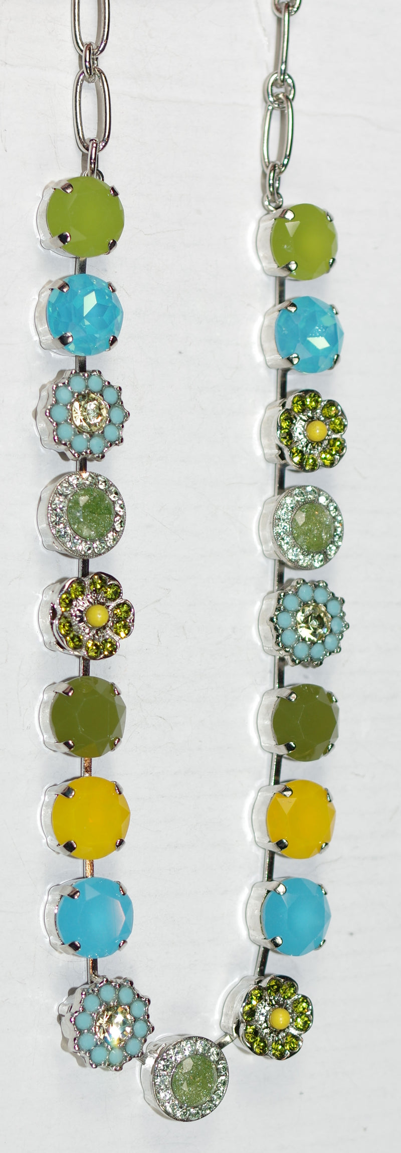 MARIANA NECKLACE PISTACHIO: blue, green, yellow 1/2" stones in silver rhodium setting, 17" adjustable chain