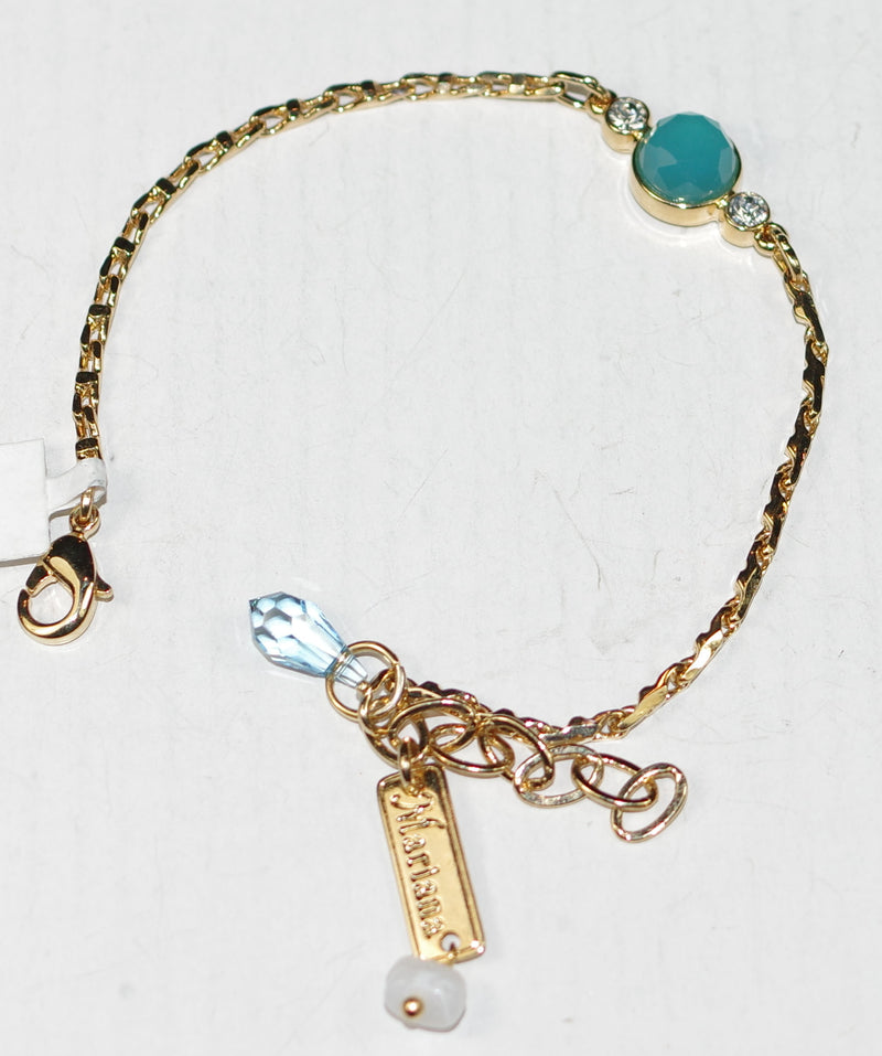 MARIANA BRACELET: blue, clear, teal stones in yellow gold setting