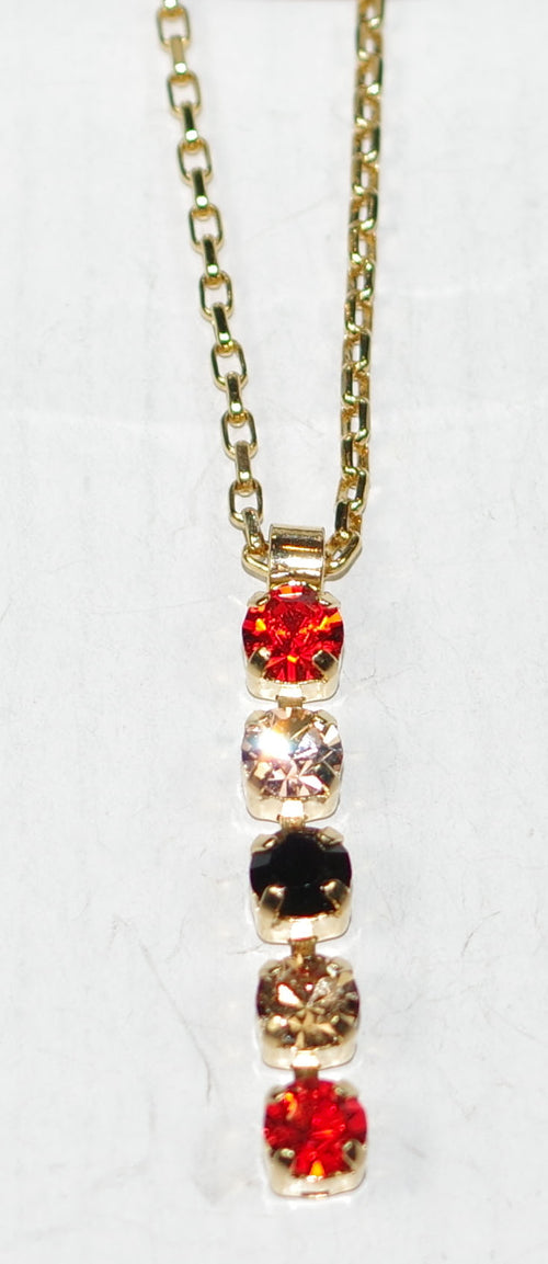 MARIANA PENDANT MAGIC: orange, black, amber stones in 1.25" yellow gold setting, 18" adjustable chain