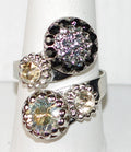 MARIANA RING BLACK ORCHID: black, amber, grey, clear stones in 1" silver rhodium setting, adjustable size band