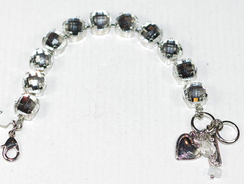 MARIANA BRACELET ON A CLEAR DAY: 1/2" clear faceted stones in silver rhodium setting